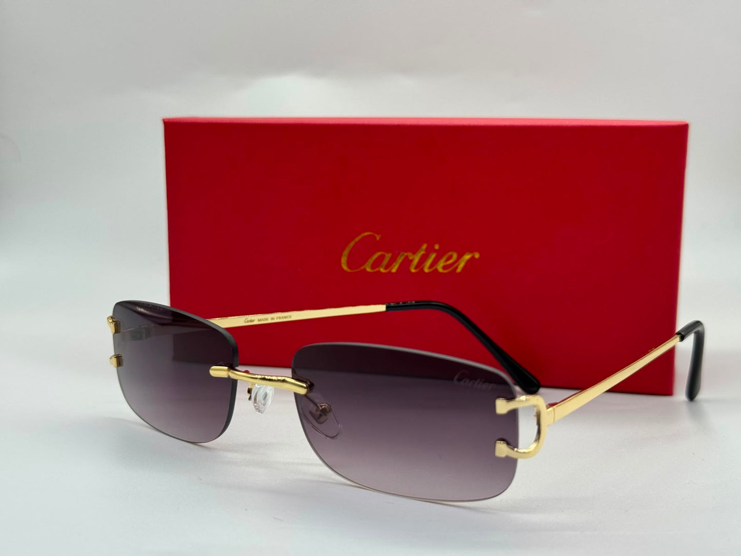 Cartier | Panthère de Rimless Rectangular Glasses – Gold / Clear