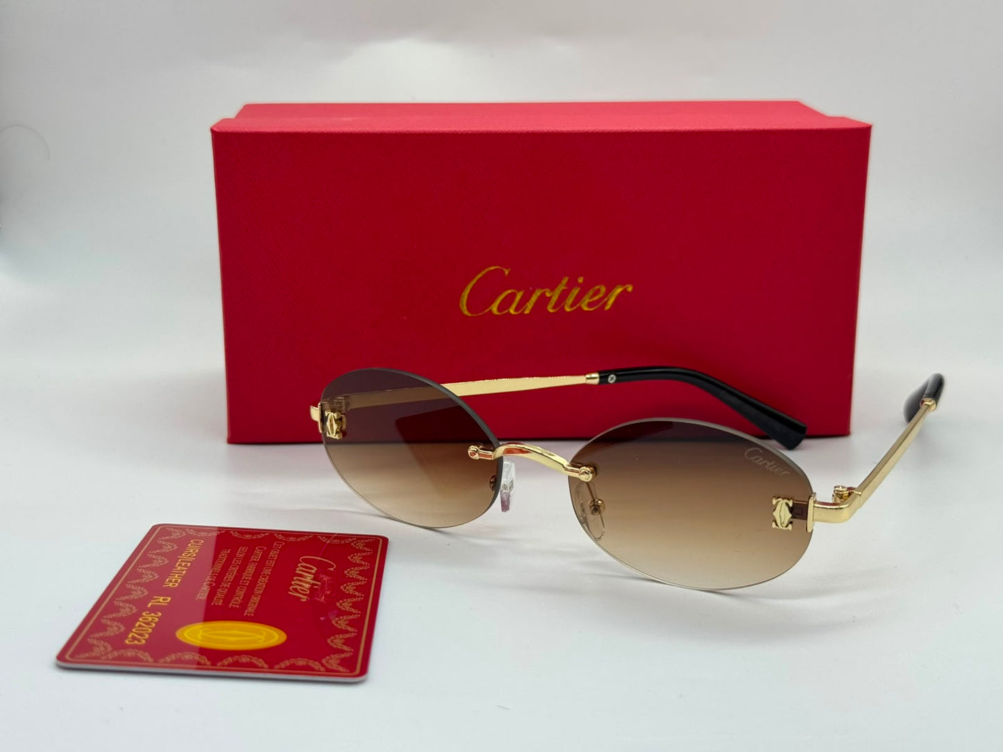 Cartier | Première Rimless Sunglasses – Gold / Light Blue