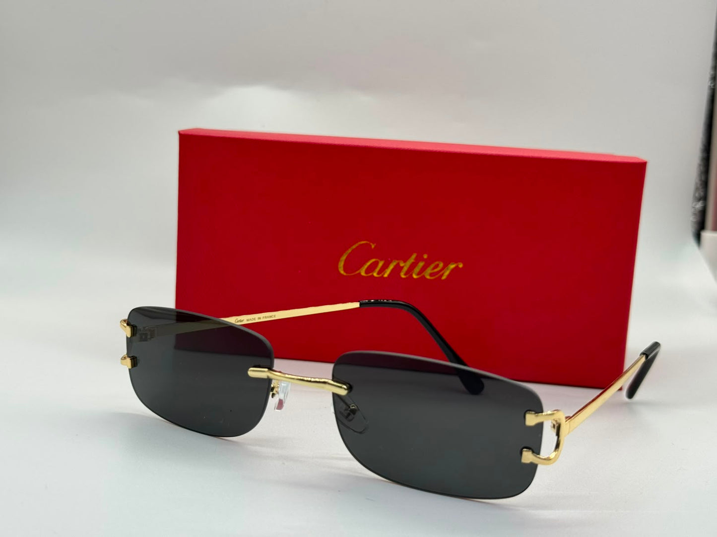 Cartier | Panthère de Cartier Rimless Sunglasses – Gold / Blue