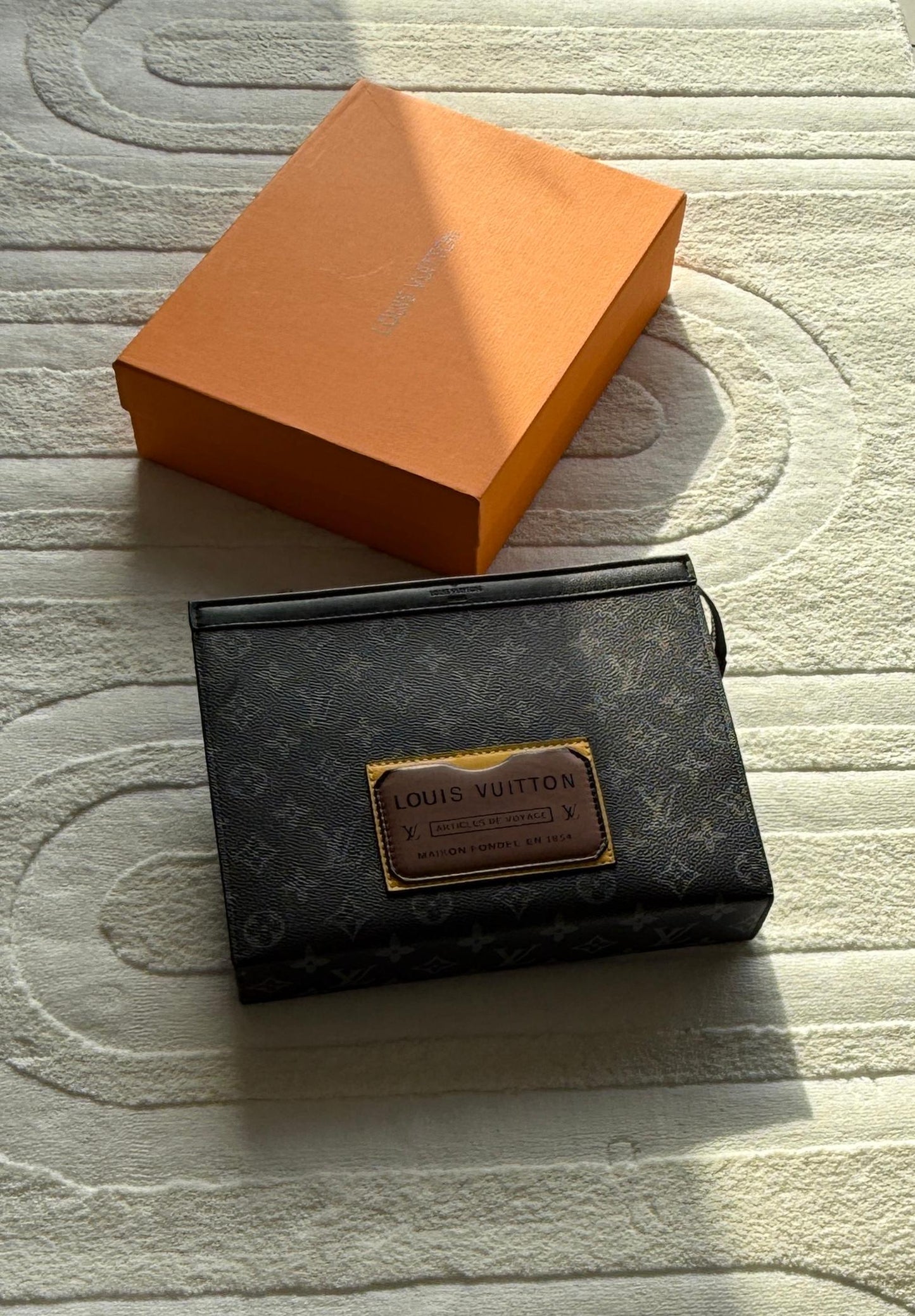 Louis Vuitton | Voyage Grained Matte LV Pouch – Grey